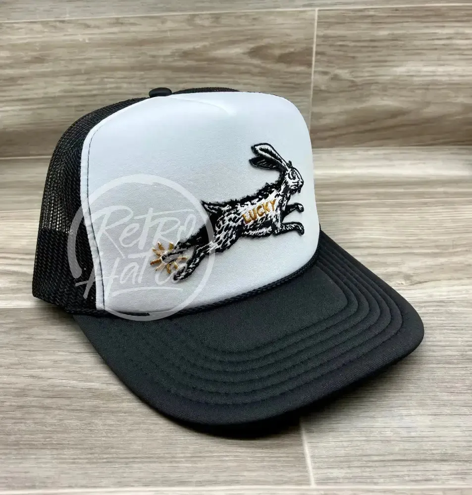 Lucky Rabbit on Black/White Meshback Trucker Hat