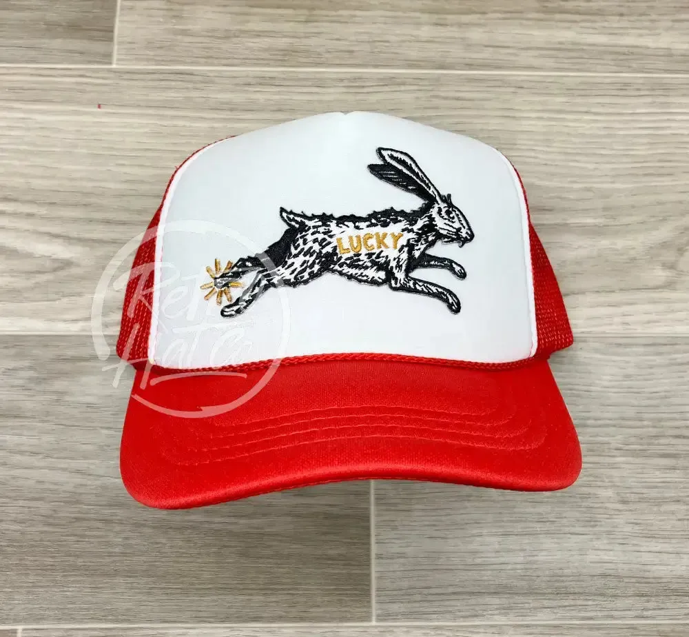 Lucky Rabbit on Red/White Meshback Trucker Hat