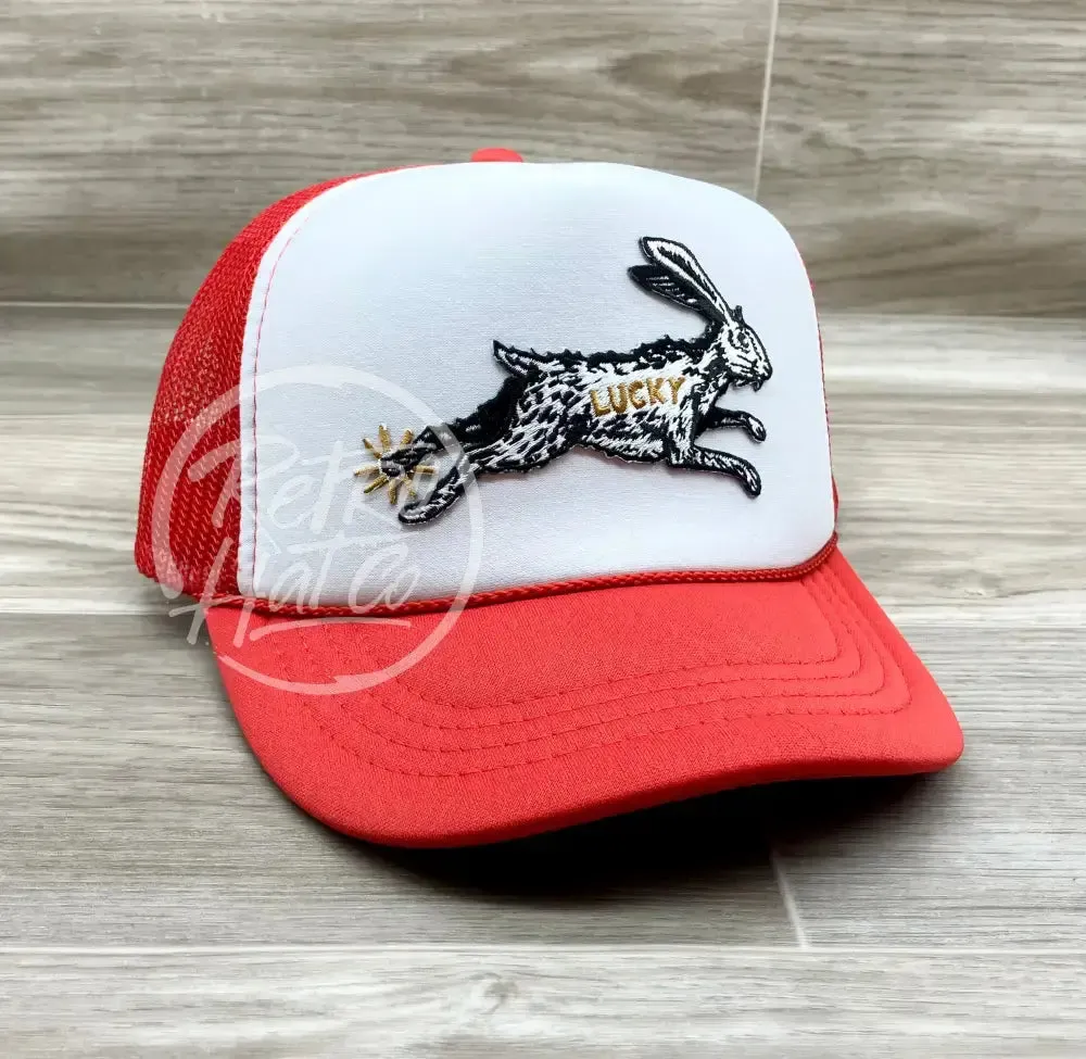 Lucky Rabbit on Red/White Meshback Trucker Hat